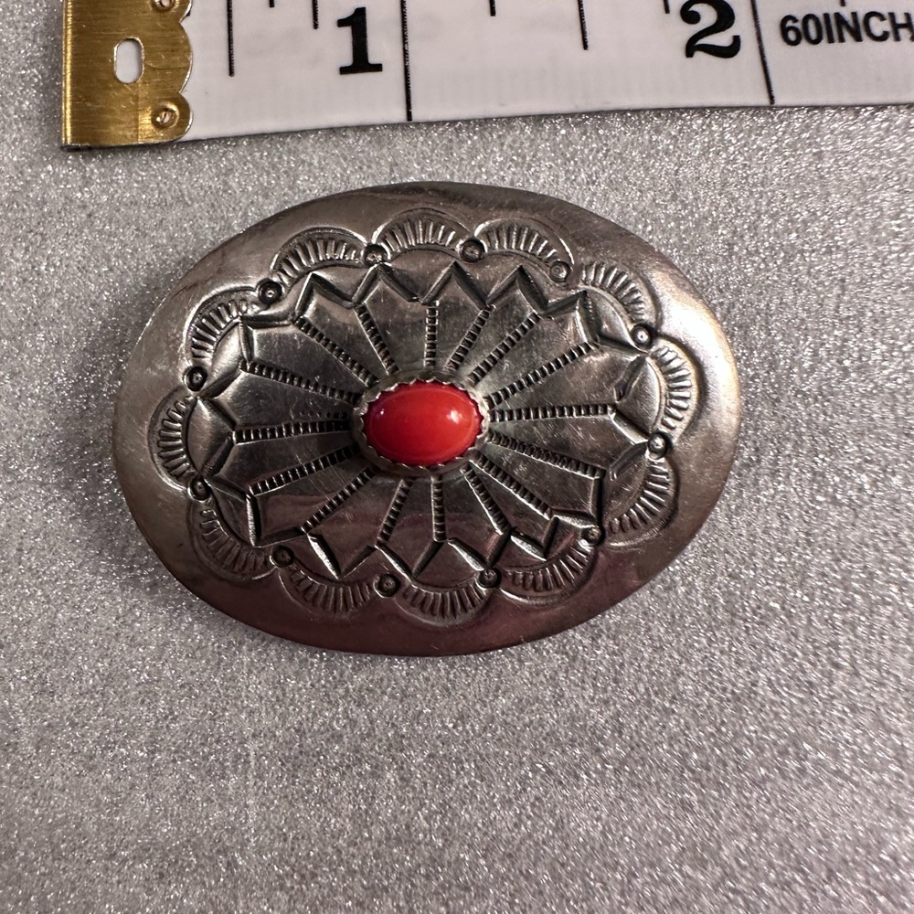 Vintage Navajo oval brooch, approximately 2 inches in diameter.